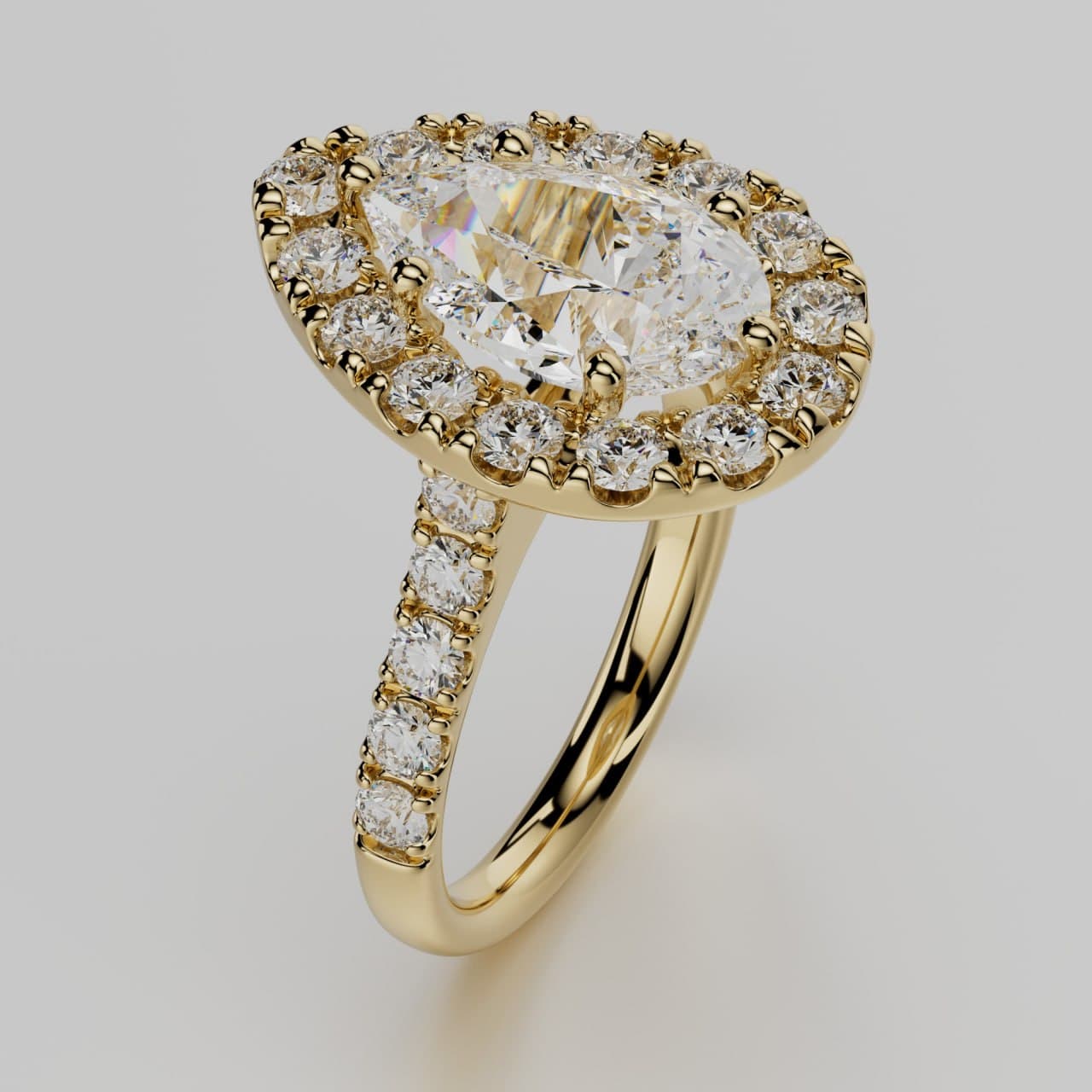 Pear-cut diamond halo ring in yellow gold, three-quarter view — photorealistic 3D render by 4rend Studio